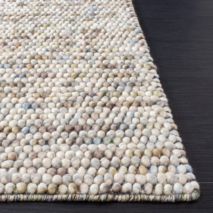 Pebbles Hand Woven Wool And Ivory Multi color Rug